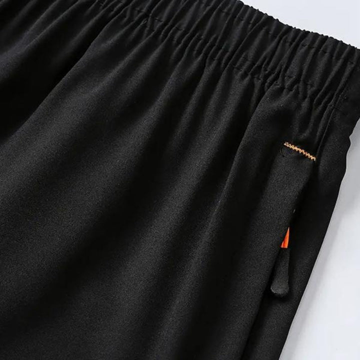 Men's Velocity quick-dry shorts, essential activewear for gym, sports & workout comfort.