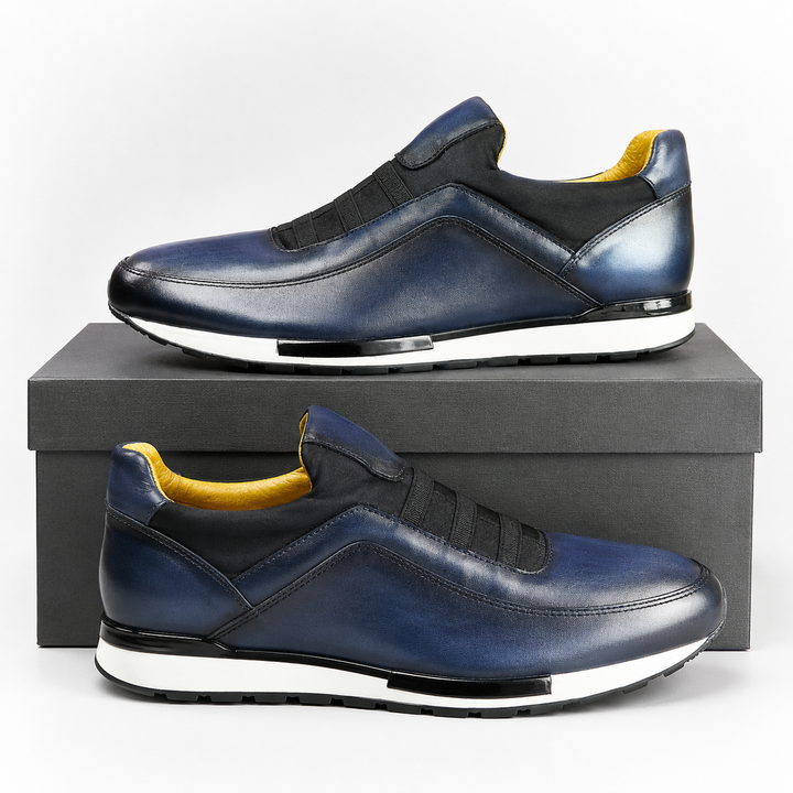 Top-down view of classic men's velour leather brogues, essential genuine leather footwear for everyday wear.