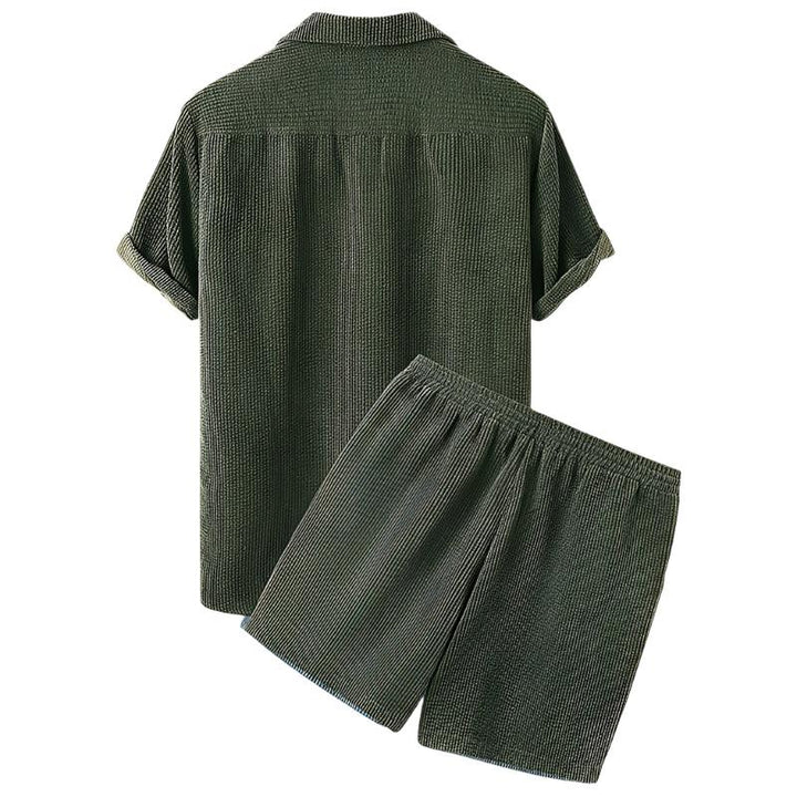 Model wearing the Fabio men's velour t-shirt and shorts set, a stylish summer outfit. Men's casual fashion