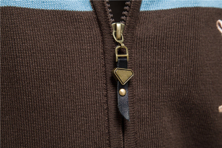 Man in stylish men's colorblock zip cardigan, demonstrating comfortable modern layering.