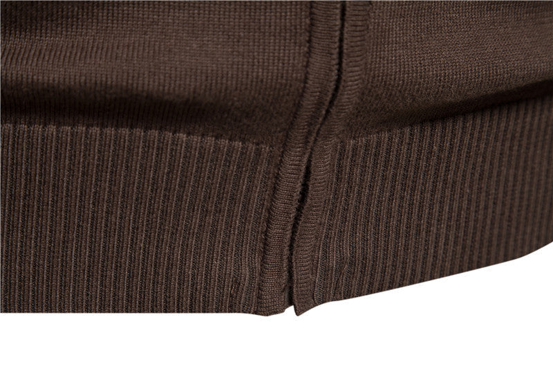 Men's colorblock zip-up cardigan worn outdoors, perfect stylish casual outerwear for all seasons.