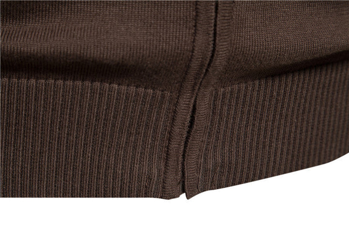 Men's colorblock zip-up cardigan worn outdoors, perfect stylish casual outerwear for all seasons.