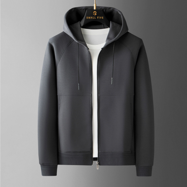 Texture close-up of soft fabric on men's Verona Elite tracksuit, engineered for active comfort.
