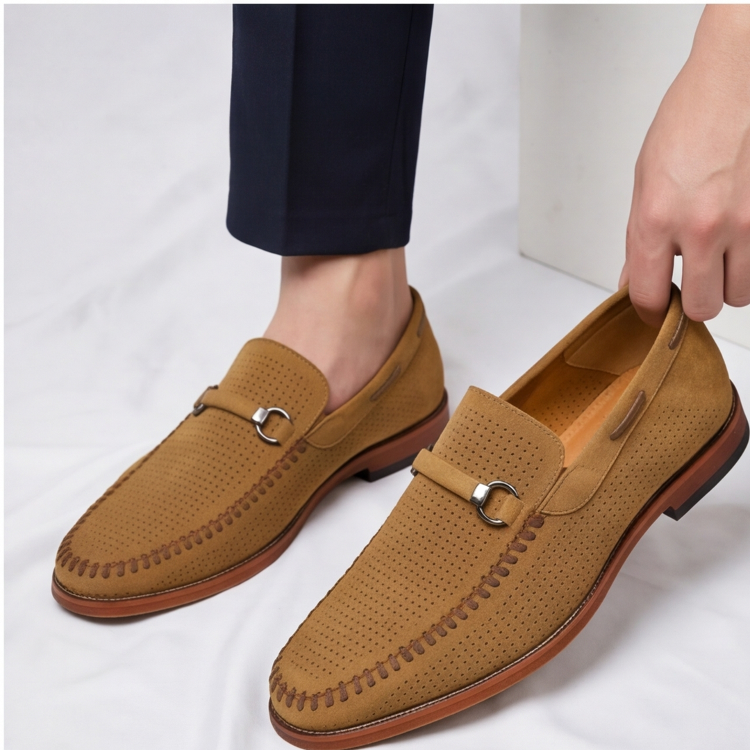 Textured close-up of the perforated detail on Men's Verona Loafers, showing breathability.