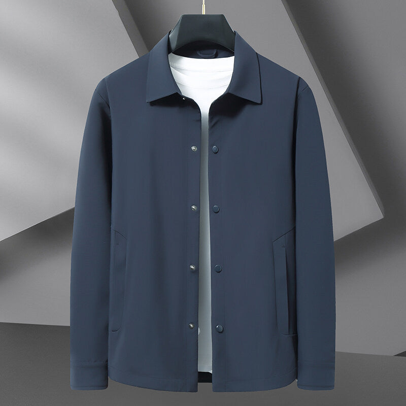 Men's versatile all-season snap jacket, lightweight & water repellent. Perfect casual outerwear for travel & layering.