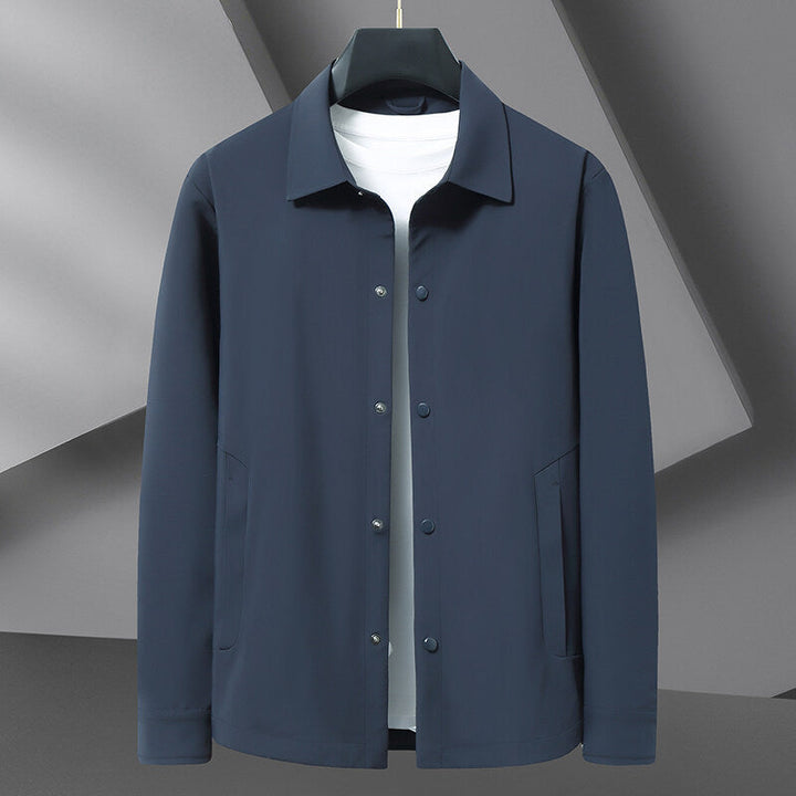 Men's versatile all-season snap jacket, lightweight & water repellent. Perfect casual outerwear for travel & layering.