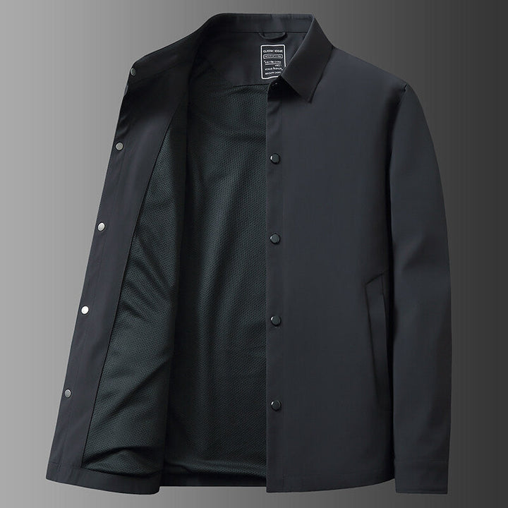 Lightweight men's snap jacket, water-repellent & versatile. Essential all-season outerwear for everyday layering.