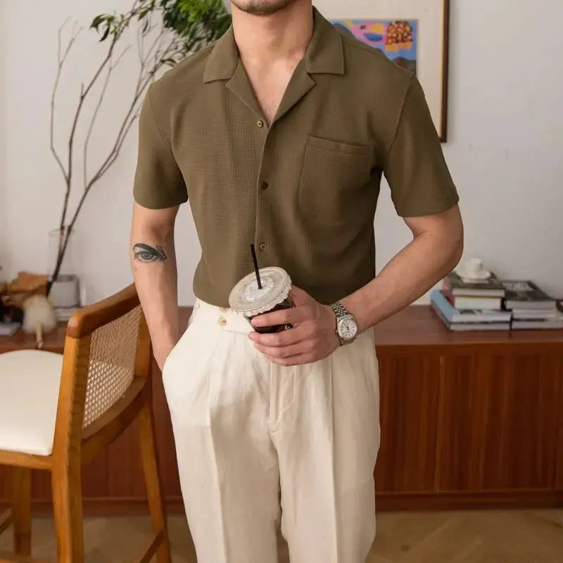 Khaki men's short sleeve collared button-up shirt, a classic choice for summer and casual fashion.