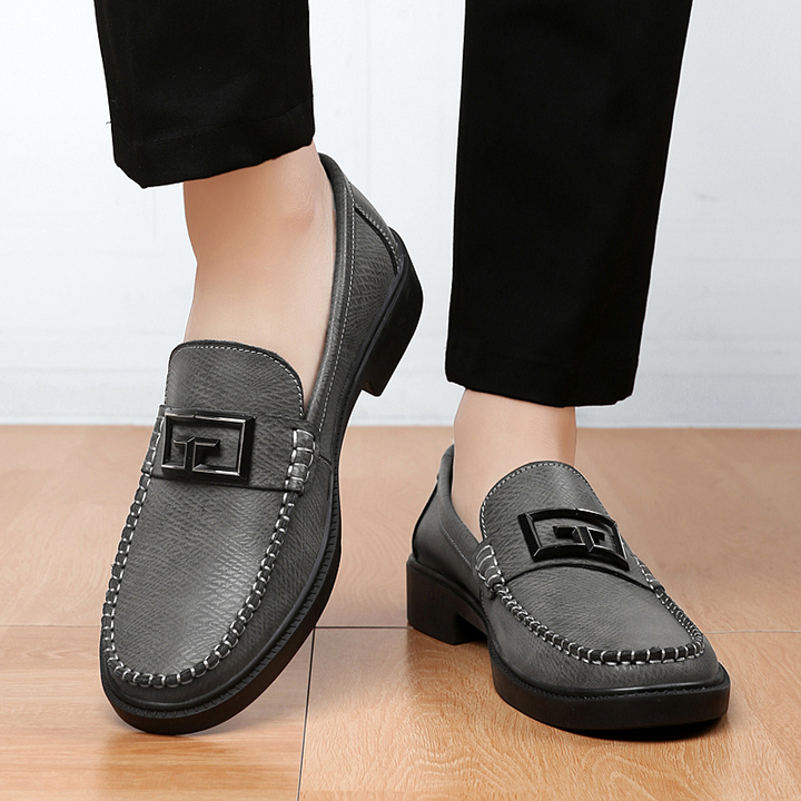 Sophisticated men's slip-on formal shoes, featuring a sleek buckle and comfortable fit.
