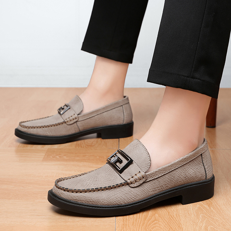 Versatile men's formal loafers, easy slip-on, featuring a prominent buckle for a sleek style.
