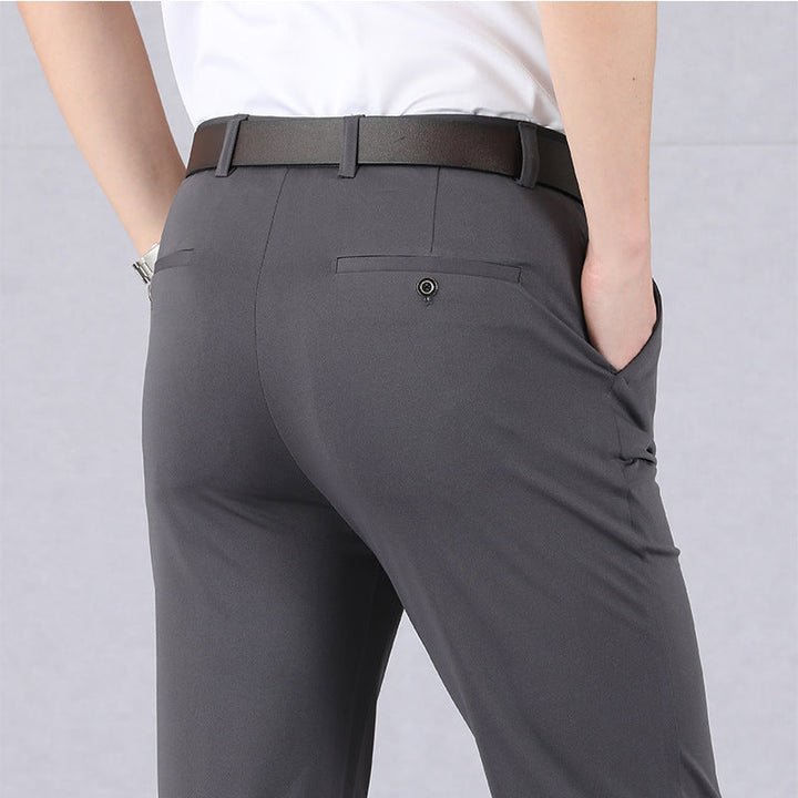 Men's versatile black stretch performance trousers, perfect for office, casual, and everyday wear. Dynamic fit.