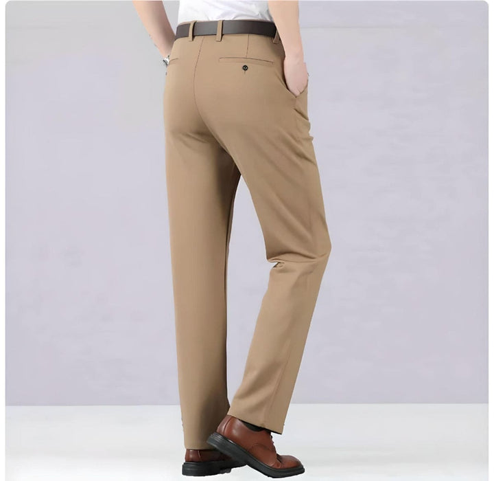 Blue men's versatile stretch pants, perfect for office, everyday, or travel. Comfortable and stylish menswear.