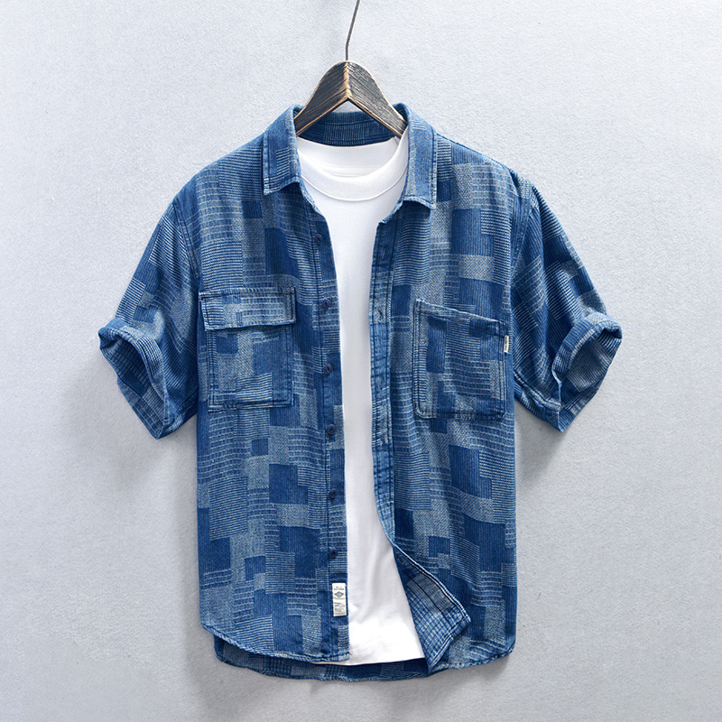 Men's versatile blue denim shirt with a relaxed fit & button-down style, perfect for casual everyday wear.