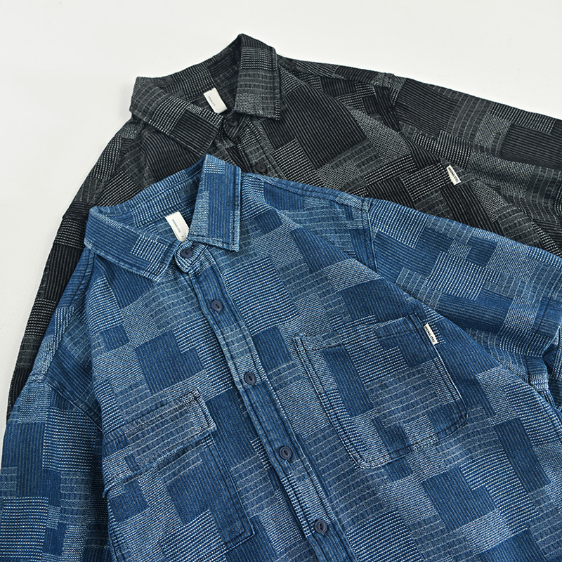 Men's casual blue denim shirt with practical chest pockets and a comfortable relaxed fit for everyday style.