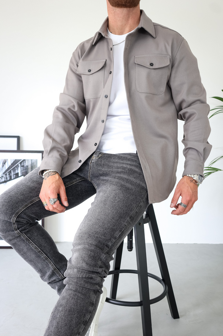 Transitional men's overshirt jacket, button-up with chest pockets, ideal for spring and fall everyday fashion.