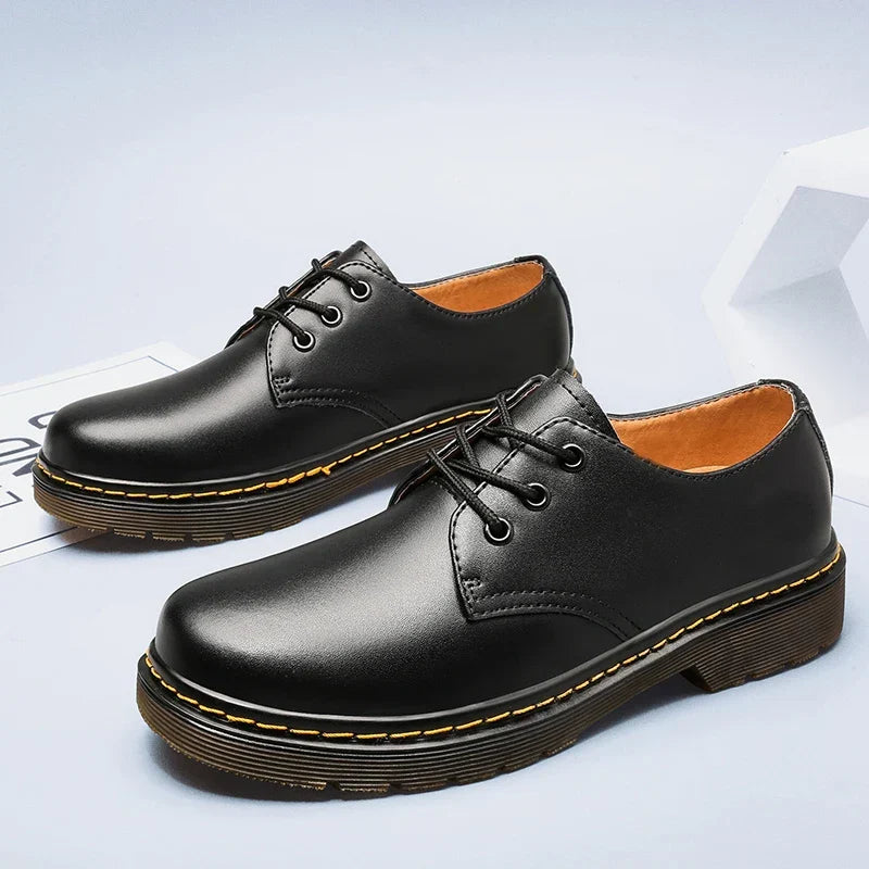 Black men's versatile dress shoes, offering comfort and style for office, business, or smart casual outfits.