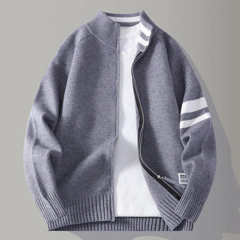 Versatile men's full zip sweater, perfect for layering. Features modern stripe detail.