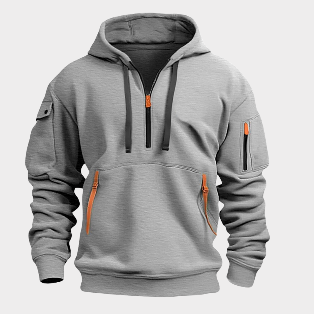 Performance men's half-zip athletic hoodie, ideal for activewear with convenient zippered pockets & comfortable fit.
