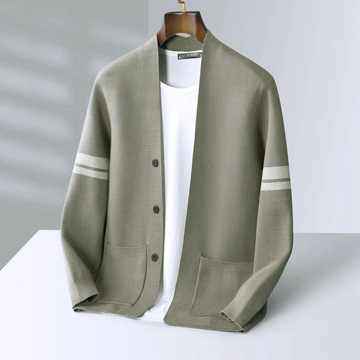 Soft knit men's cardigan featuring patch pockets. Offers comfort and versatile style.
