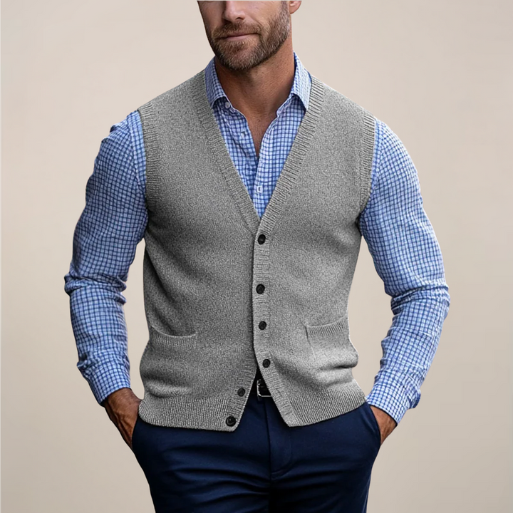 Modern men's sleeveless sweater vest, offering an effortless, stylish layered look for any occasion.