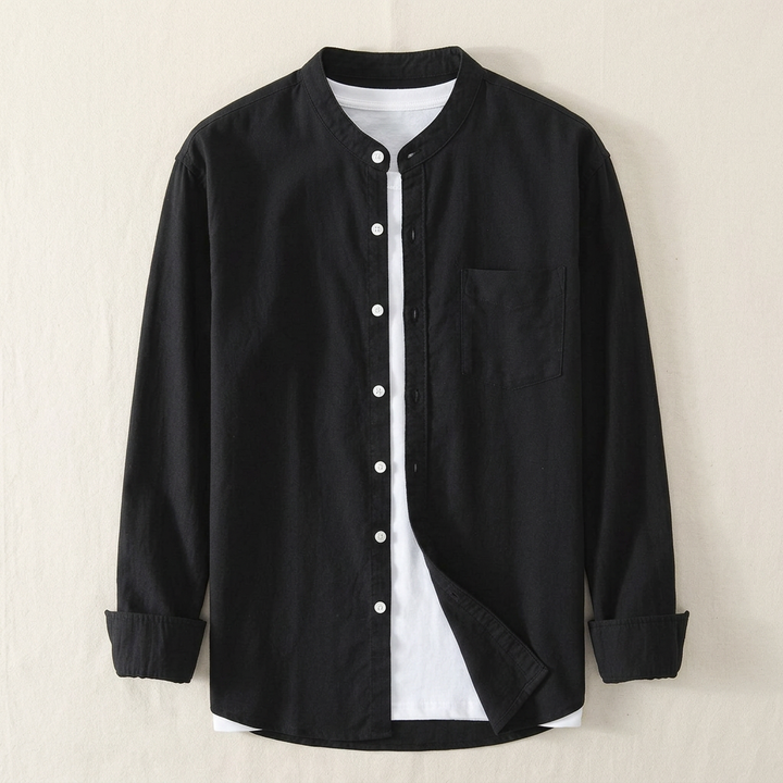 Men's classic blue long sleeve button-up shirt. Versatile for both formal & casual men's attire.