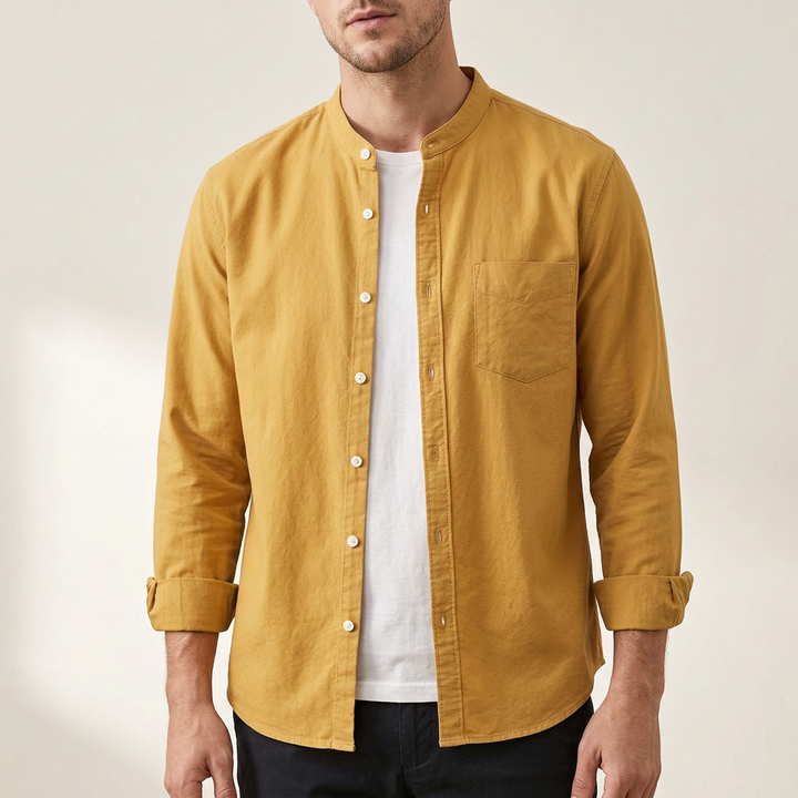 Stylish men's long sleeve button-up shirt. Classic design, versatile for any season or occasion.