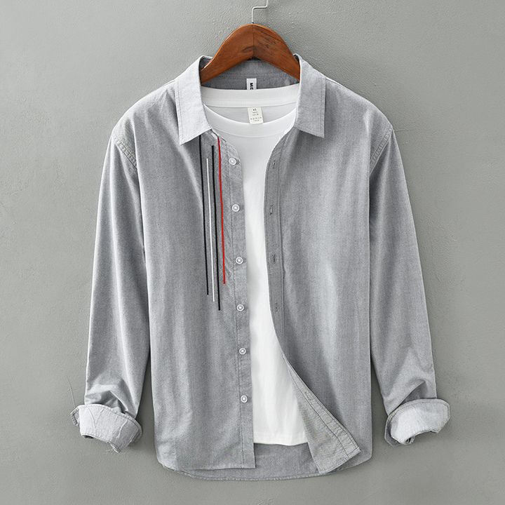 Striped long-sleeve men's polo shirt, ideal for casualwear and a smart everyday fashion look.