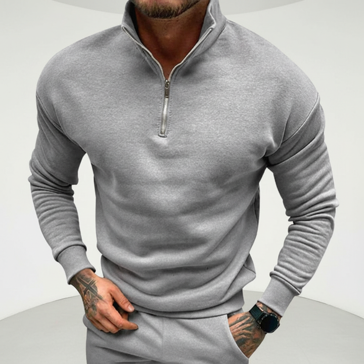 Detail of knit texture on a men's versatile long sleeve cotton blend half-zip sweater