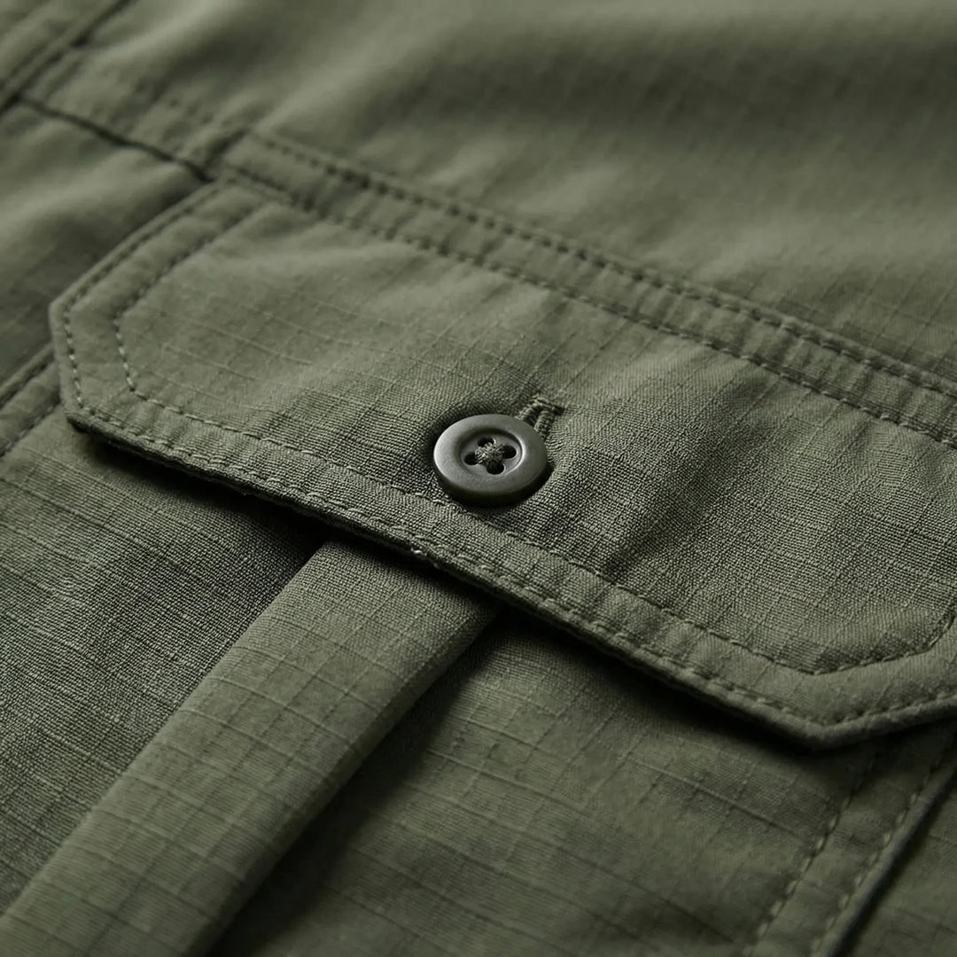 Men's quick-dry fishing & camping shirt, offering sun protection & versatility with zip-off long sleeves.