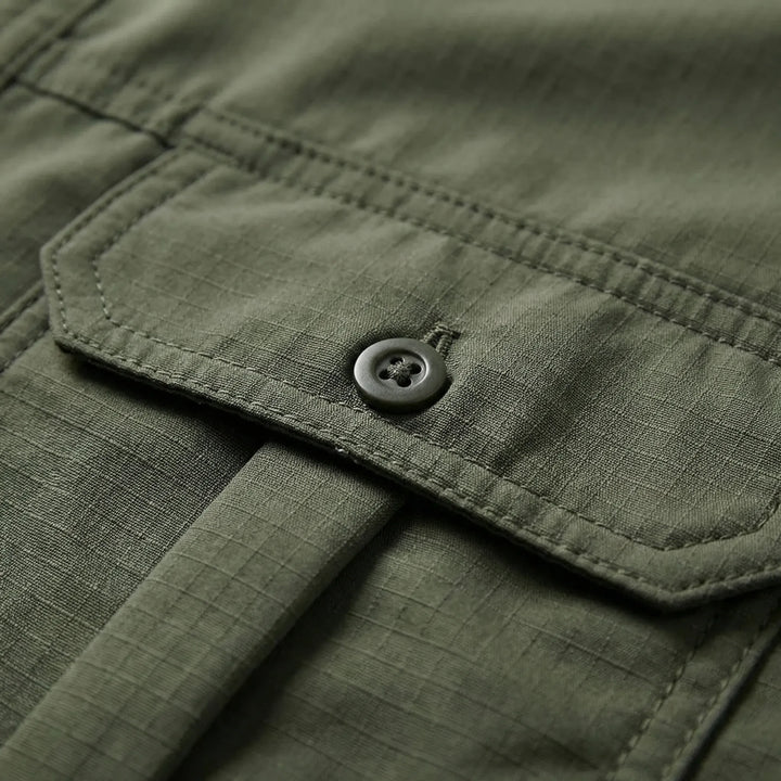 Men's quick-dry fishing & camping shirt, offering sun protection & versatility with zip-off long sleeves.