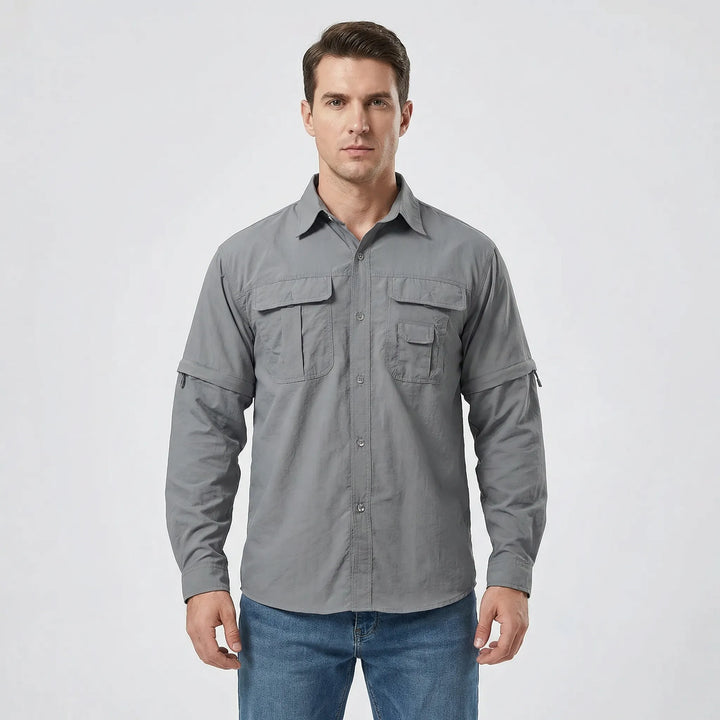 Stylish men's travel shirt, with zip-off sleeves for adaptability in varying climates and outdoor activities.