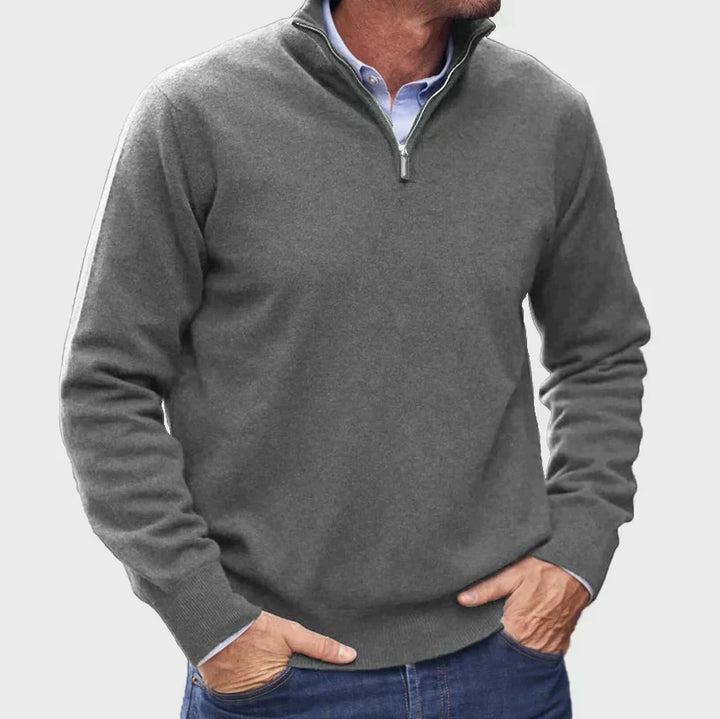 Fashionable men's quarter-zip sweater, designed for easy layering and a modern, elegant look.