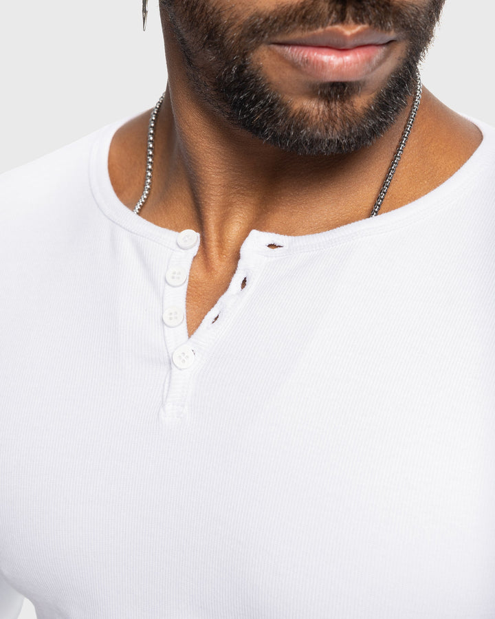 Everyday comfort in a men's rib knit henley shirt with a button neck.