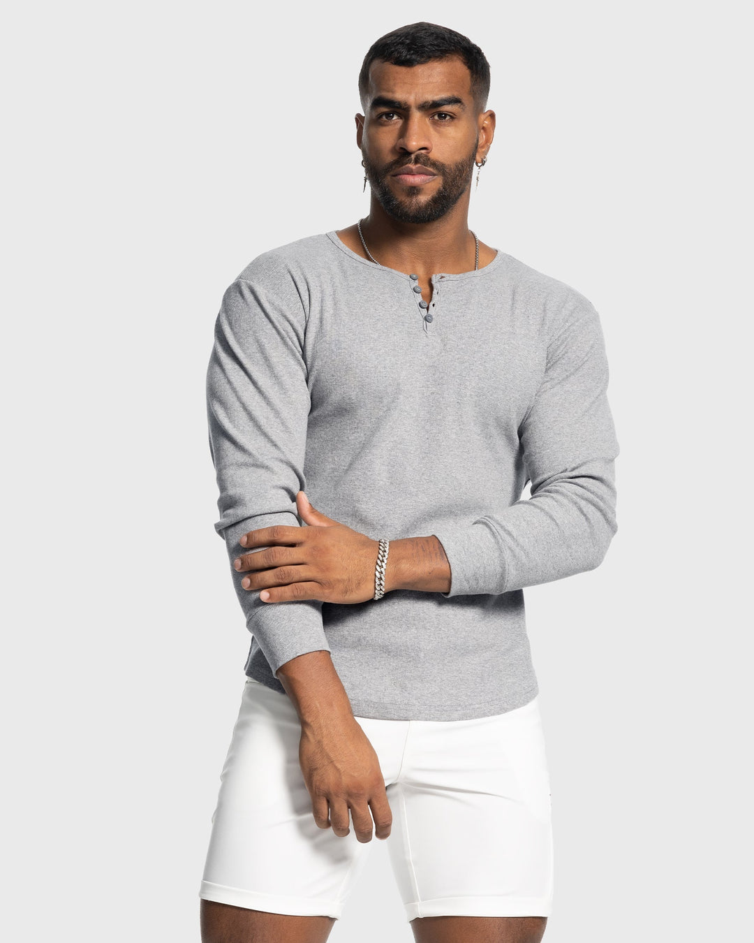 Versatile men's button neck henley shirt, long sleeve, ideal for various casual outfits.
