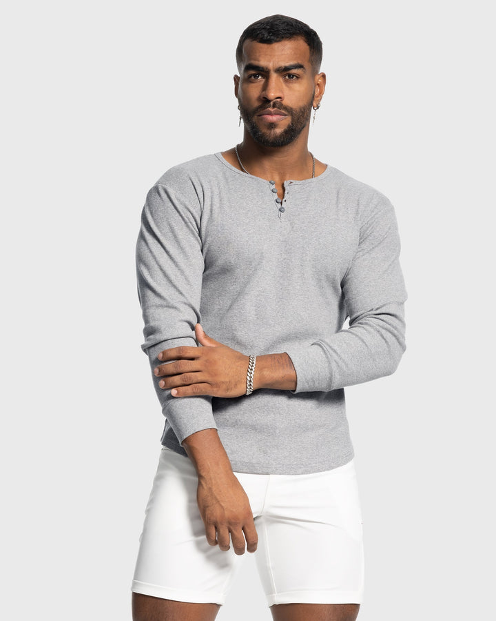 Versatile men's button neck henley shirt, long sleeve, ideal for various casual outfits.