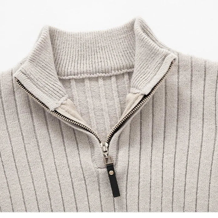 Comfortable men's long sleeve ribbed half-zip sweater in a neutral tone, perfect for versatile wear.