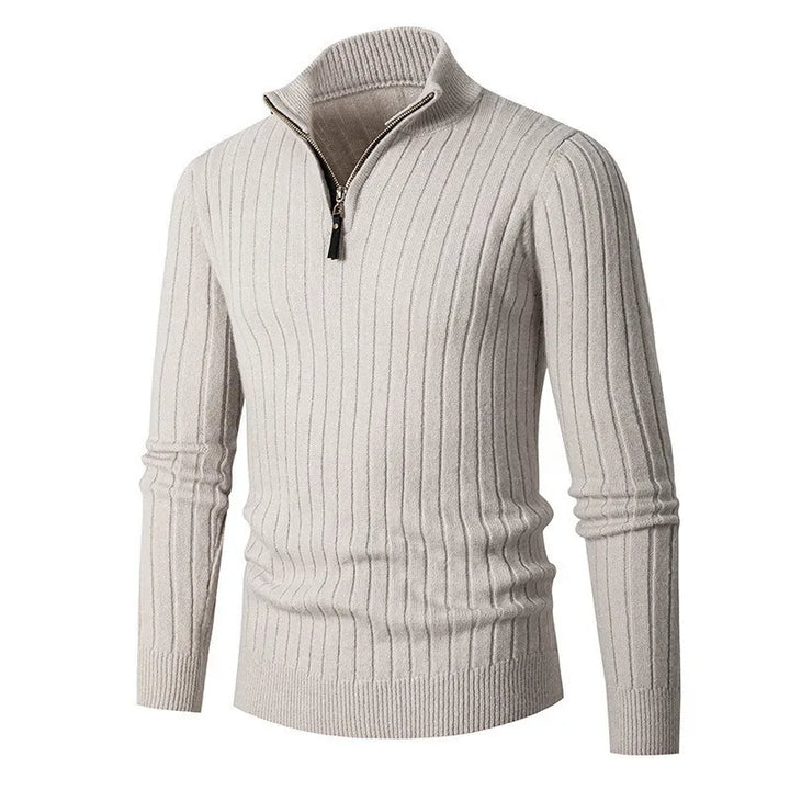 Man wearing a versatile men's ribbed half-zip sweater, showcasing modern comfort and casual elegance.