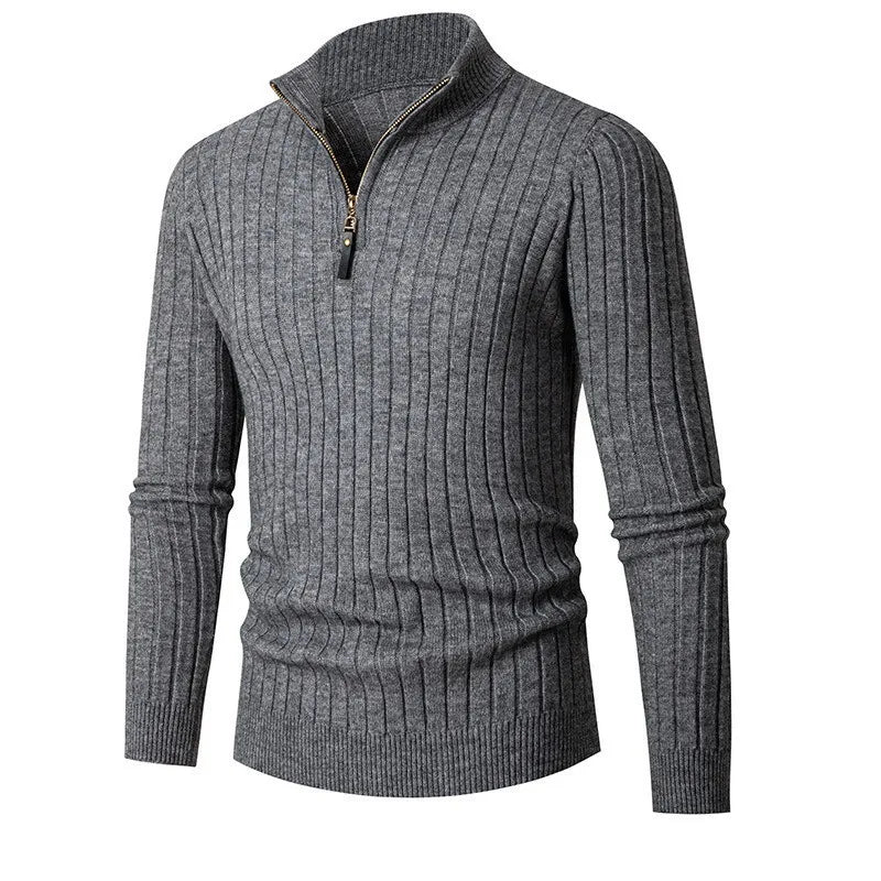 Close-up of a men's ribbed half-zip sweater, highlighting its unique texture and modern fit.