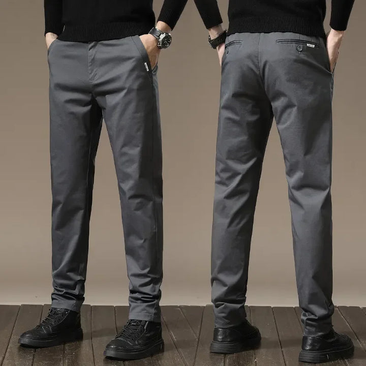 Modern men's slim fit dress pants, designed for versatile fashion and a wrinkle-resistant finish.