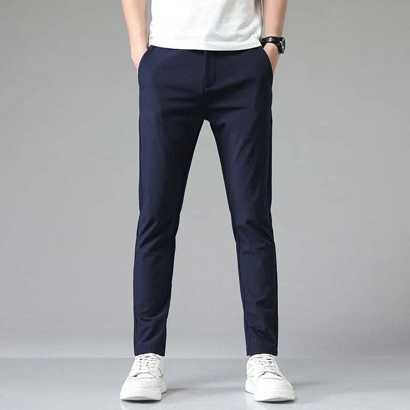 Professional men's straight fit dress pants, wrinkle-resistant and stretchy for comfortable workwear.