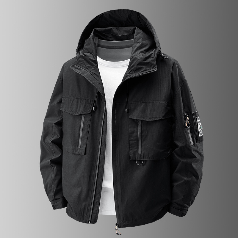 Durable men's weather-resistant tactical utility jacket, perfect for outdoor adventures with many secure pockets.