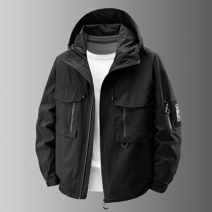 Durable men's weather-resistant tactical utility jacket, perfect for outdoor adventures with many secure pockets.