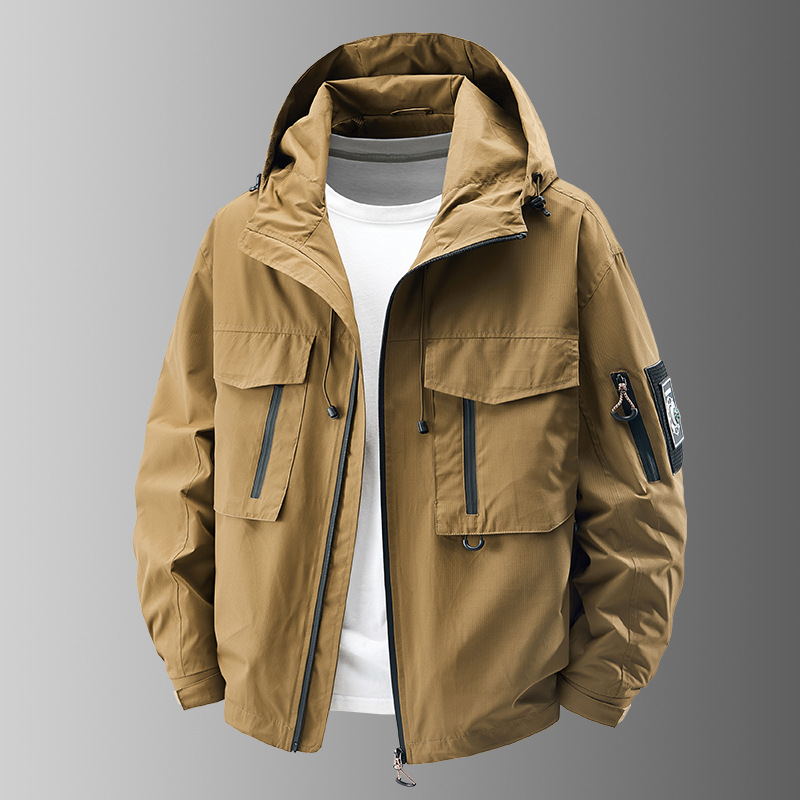 Stylish men's adventure jacket, ideal for fall/spring travel. Multi-pocket design & weather-resistant.
