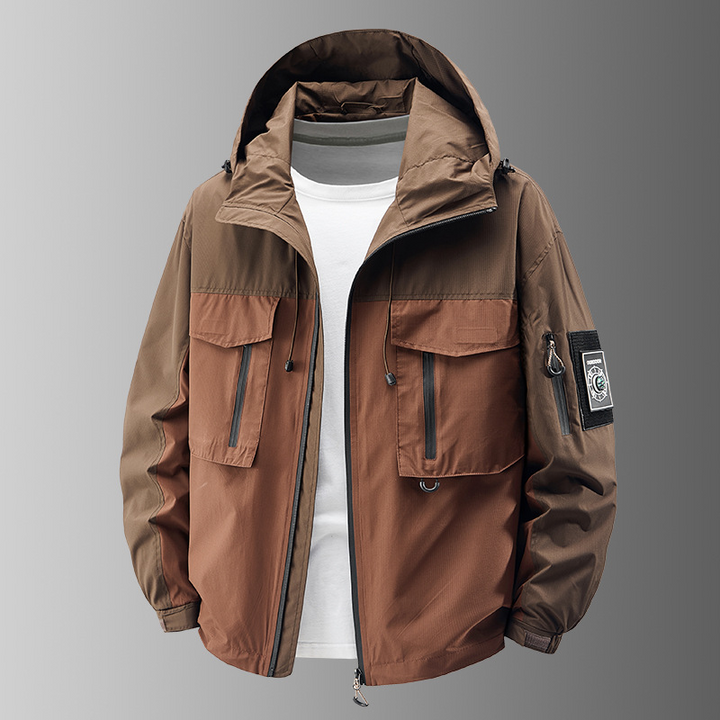 Multi-pocket men's tactical jacket: secure storage for travel, outdoor gear & everyday essentials. Durable design.