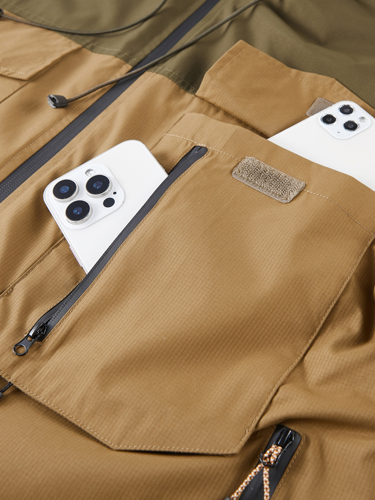 Versatile men's adventure jacket, durable & weather-resistant. Utility outerwear with secure pockets for travel.