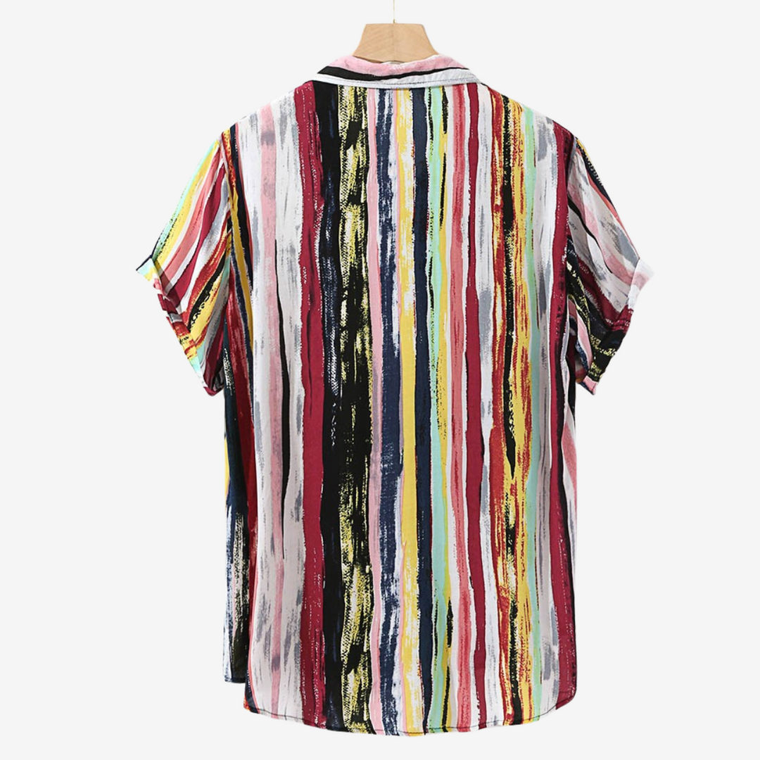 Men's vibrant abstract print holiday shirt, perfect beachwear and a comfortable summer travel outfit.