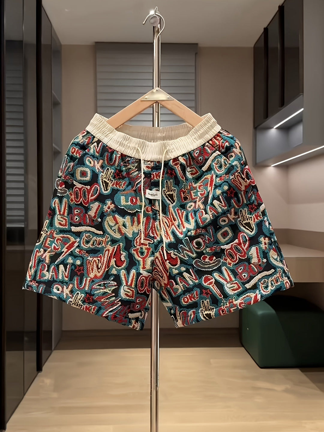 Men's vibrant graffiti urban style shorts for casual wear. Comfortable graphic print streetwear perfect for summer fashion.