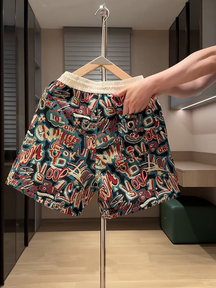 Comfortable men's graffiti shorts with a vibrant urban graphic print. Ideal for streetwear, lounging, or beach fashion.