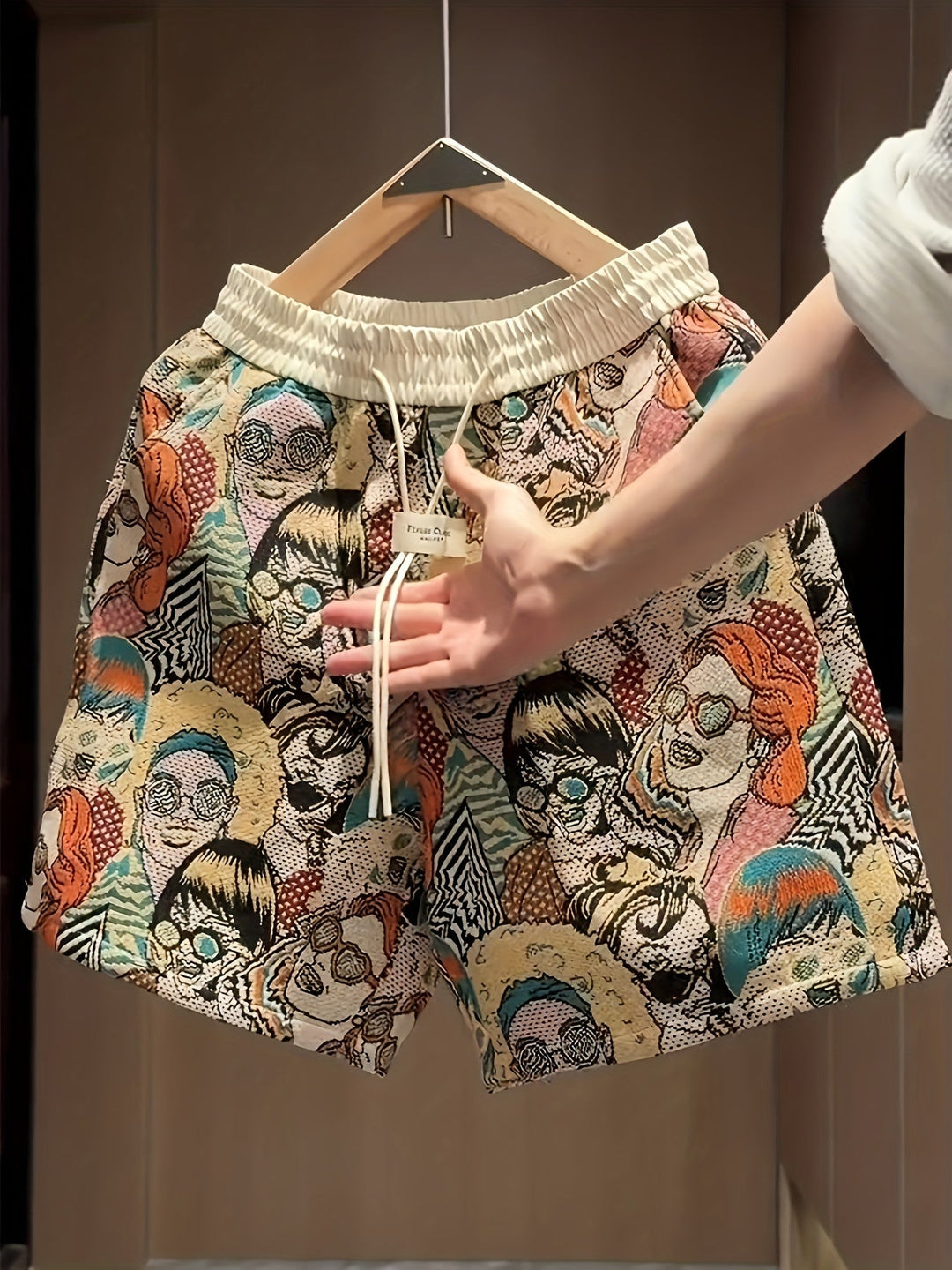 Men's relaxed fit summer shorts featuring a vibrant retro graphic pop art print. Casual, comfortable, and stylish.