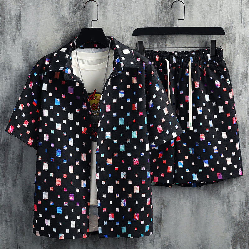 Stylish men's vibrant two-piece set, perfect for summer lounge wear. Comfortable & fashionable.